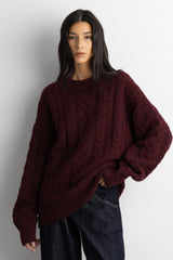 OVERSIZED CABLE KNIT SWEATER