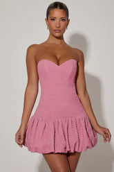 Cut-Out Bubble Hem Corset Mini Dress in Dusty Pink